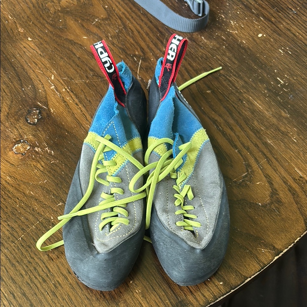 Gray and Blue Athletic Shoes with Snug Fit and Precise Lacing